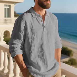 Close-up detail of grey linen long sleeve polo shirt with buttons on a coastal balcony