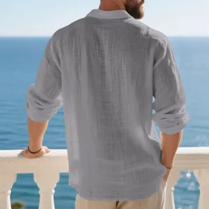 Back view of a breathable gray linen long sleeve shirt for men on a coastal balcony