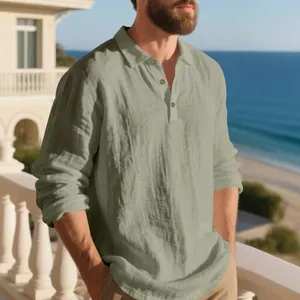 Detailed view of a men's sage green long sleeve linen polo shirt in a relaxed resort setting