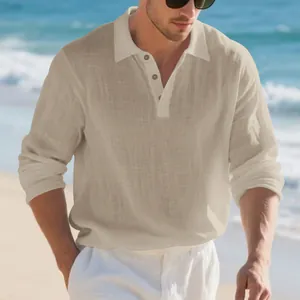 Men's casual long-sleeved beige linen polo shirt worn on a sunny beach background