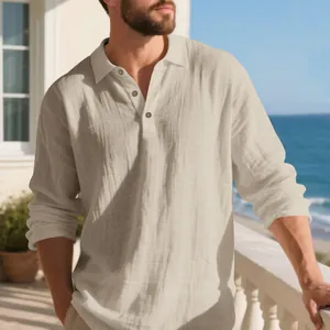 Men's loose fit linen long sleeve polo shirt with buttoned collar on a seaside balcony