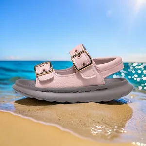Comfortable pink children's beach sandals featuring soft grey soles and dual buckles