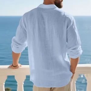 Back view of men's light blue linen polo shirt showing relaxed fit and textured fabric