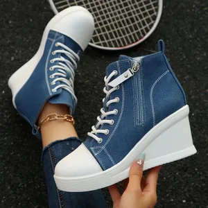 Blue denim high-top wedge sneakers for women featuring a side zipper and white soles