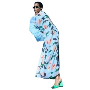 Cardigan de plage bleu à fleurs avec manches volantées pour les vacances d'été