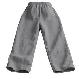 Full view of men's loose-fit grey linen pants showing the high-quality textures
