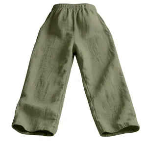 Detailed macro view of olive green loose cotton linen casual pants with crinkled texture