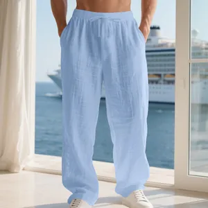Detailed macro view of light blue linen men's casual pants with drawstring waist