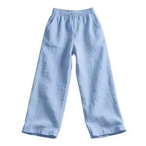 Close-up of light blue men's loose linen lounge pants with a drawstring elastic waist.