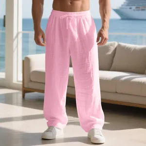 Men's loose pink linen casual trousers perfect for a relaxed holiday beach style
