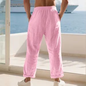 Back view of pink linen casual pants showing loose fit and textured fabric detail