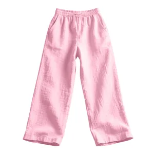 Close-up detail of soft pink linen wide-leg lounge pants with drawstring waist