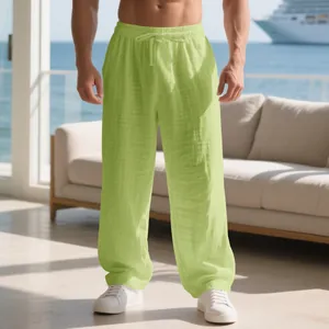 Detail showing texture of men's loose linen pants in lime green with drawstring