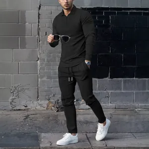 Men's stylish waffle knit 2-piece set featuring quarter-zip lapel top and matching pants.