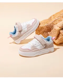 Detailed shot of kids fashion board shoes in pink and white with Hobibear branding