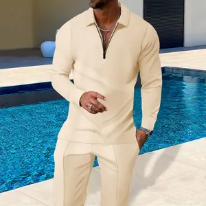Close-up of men's waffle knit tracksuit set with quarter-zip polo collar