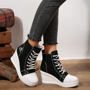 Stylish women's black and white high-top wedge canvas shoes with lace-up design