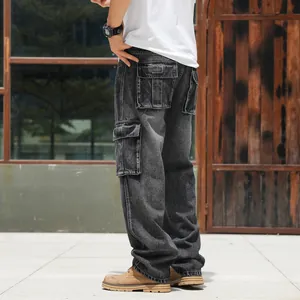 Side view detail of men's wide-leg cargo jeans with oversized pockets
