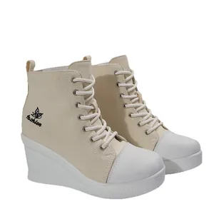 Womens stylish beige high top wedge canvas sneakers with a comfortable lace-up design