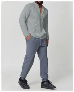 Men's gray hooded long-sleeve quick-dry sports t-shirt for outdoor hiking and fitness.