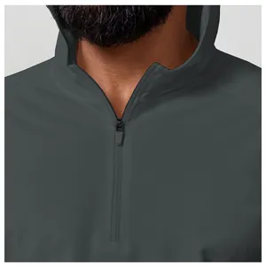 Close-up of the professional stitching and half-zip on this grey men's sports hoodie