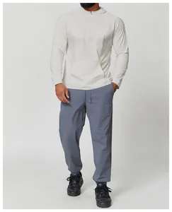 Full view of a men's hooded sun protection long-sleeved athletic shirt in light grey.