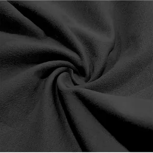 Macro detail showing the breathable linen fabric texture of these men's casual pants.