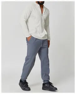 Detail showing a white men's hooded quick-dry long sleeve t-shirt for outdoor fitness