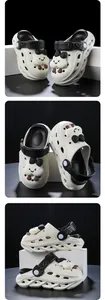 Detailed views of white cartoon clogs for boys with cute cloud and bow decorations