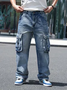 Detailed outdoor shot of men's loose fit baggy cargo jeans with multi-pocket design