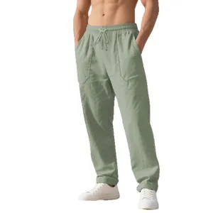 Men's loose sage green linen pants for beach and casual wear with drawstring waist