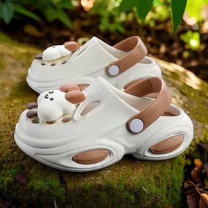Elegant cream and brown platform clogs for women featuring cute cartoon bear mascot