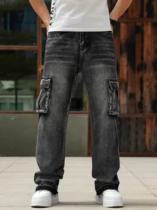 Detailed front view of men's loose wide-leg cargo jeans in washed grey denim style.
