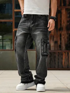 Detailed view of men's loose-fit black washed cargo jeans showing side pockets and fit.