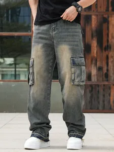 Loose fit cargo jeans for men with multiple pockets and a vintage washed denim finish.