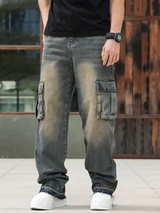 Front view of men's vintage washed baggy cargo jeans with large side pockets
