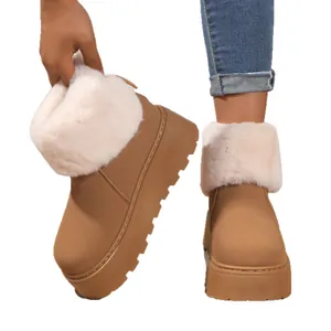 Stylish women's platform snow boots with thick white fur trim and brown suede finish