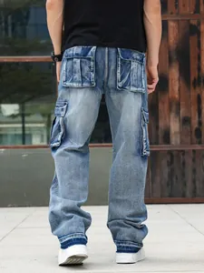 Detailed back view of men's loose cargo denim jeans featuring functional multi-pocket design