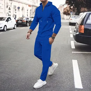 Blue waffle knit tracksuit for men featuring a hooded long sleeve top and matching pants.