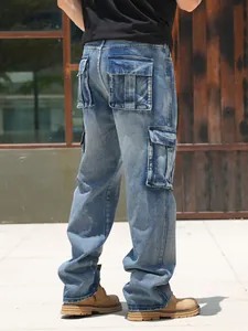 High quality men's loose-fit multi-pocket cargo denim jeans in a vintage washed blue finish