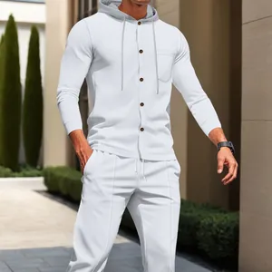 Detailed view of men's white waffle knit tracksuit featuring a hooded button cardigan