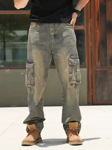 Men's loose wide-leg cargo jeans in vintage wash with multi-pockets full-body view