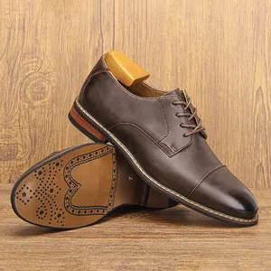 Side profile and sole detail of classic brown leather men's formal business shoes