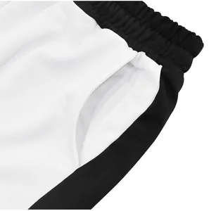 Close-up detail of side pocket and elastic waistband on men's heavy fleece joggers