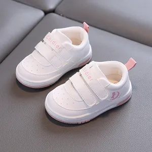 Toddler white leather walking shoes with soft soles and pink accents for 1-3 years