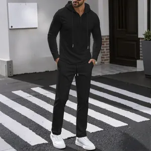 Men's black waffle knit hoodie and pants tracksuit set for outdoor casual sports