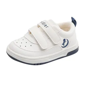 Toddler walking shoes with soft non-slip soles and breathable white leather upper