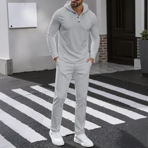 Men's stylish grey waffle knit tracksuit set with hooded long sleeve top and pants