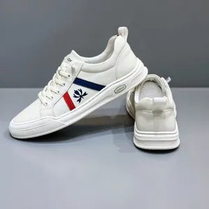 Men's stylish white leather casual sneakers featuring classic red and blue stripe details