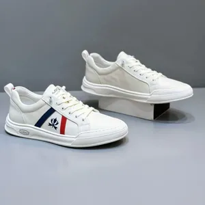 Stylish men's white leather sneakers with striped accents and flat comfortable sole